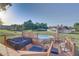 Backyard deck area featuring an above ground pool, hot tub, and outdoor seating at 2801 Sw 139Th St, Ocala, FL 34473
