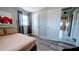 Charming bedroom with new wood floors, two closets, and neutral paint to bring out the light at 331 Greens End St, Orlando, FL 32810
