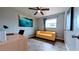 This bedroom has modern plank flooring and a ceiling fan at 331 Greens End St, Orlando, FL 32810