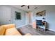 This bedroom features light-tone walls and updated flooring at 331 Greens End St, Orlando, FL 32810