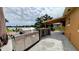 Outdoor kitchen with stainless steel grill and a view of the water at 331 Greens End St, Orlando, FL 32810