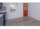Efficient kitchen featuring stainless steel appliances, modern countertops, and wood-look floors at 3524 Amigos Ave, Orlando, FL 32808