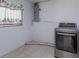 Laundry room with tile flooring and a new dryer at 3524 Amigos Ave, Orlando, FL 32808