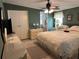 Serene bedroom suite with neutral tones, featuring a large closet for ample storage at 361 Dreama Dr, Davenport, FL 33897