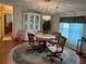 Formal dining room showcasing a chandelier and an elegant china cabinet at 361 Dreama Dr, Davenport, FL 33897