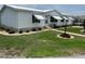 Charming single-story home with well-maintained lawn, awnings, and tasteful landscaping at 361 Dreama Dr, Davenport, FL 33897