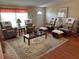Inviting living room with ample seating and natural light creating a welcoming atmosphere at 361 Dreama Dr, Davenport, FL 33897