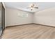 Large bedroom featuring light wood floors, neutral walls and natural light at 3942 Orange Lake Dr, Orlando, FL 32817