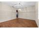 Spacious dining area featuring hardwood floors, recessed lighting, and a vintage chandelier at 3942 Orange Lake Dr, Orlando, FL 32817