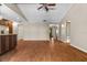 Open concept living space featuring hardwood floors, natural light, and neutral paint tones at 3942 Orange Lake Dr, Orlando, FL 32817