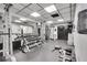 Well-equipped fitness center featuring weight racks, machines, mirrors and ample workout space at 400 E Colonial Dr # 1609, Orlando, FL 32803