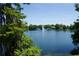 Picturesque lake view featuring a fountain surrounded by lush greenery at 400 E Colonial Dr # 1609, Orlando, FL 32803