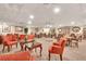 Large meeting room with ample seating, decorative tables, and elegant lighting for community gatherings at 400 E Colonial Dr # 1609, Orlando, FL 32803