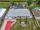 Lovely aerial view of the home featuring a pool, backyard, and unique stone and red brick driveway at 4021 Queen Anne Dr, Orlando, FL 32839