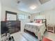 Cozy bedroom with neutral decor, tiled floors, and a comfortable atmosphere at 4021 Queen Anne Dr, Orlando, FL 32839