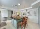 Spacious kitchen island with ample storage and seating, seamlessly connecting to other living spaces at 4021 Queen Anne Dr, Orlando, FL 32839