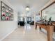 Spacious living room with tile flooring, elegant decor, and seamless flow into the kitchen at 4021 Queen Anne Dr, Orlando, FL 32839