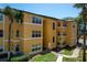 Lovely three-story building with well-maintained landscaping and ample natural light at 4528 Commander Dr # 2033, Orlando, FL 32822