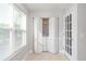 A neat, well-lit laundry area tucked away, equipped with a washer and dryer at 4528 Commander Dr # 2033, Orlando, FL 32822