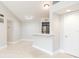 Inviting living space with tile flooring, high ceilings, and a convenient kitchen bar at 4528 Commander Dr # 2033, Orlando, FL 32822