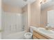 Bathroom features a shower/tub combo, a single vanity, and neutral paint at 476 Basking Ridge Ct, Ocoee, FL 34761