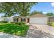 Charming single-Gathering home featuring an attached two car garage and mature landscaping at 476 Basking Ridge Ct, Ocoee, FL 34761