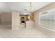 Eat-in kitchen featuring wood cabinets, bright countertops and stainless steel appliances at 476 Basking Ridge Ct, Ocoee, FL 34761