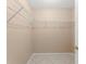 Walk-in closet with adjustable wire shelving for customizable storage solutions at 476 Basking Ridge Ct, Ocoee, FL 34761
