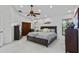 Spacious main bedroom with a ceiling fan, decorative furnishings, and lots of natural light at 4905 Emilee Grace Ln, St Cloud, FL 34771