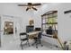 Bright office space with a ceiling fan, a large window, and modern decor at 4905 Emilee Grace Ln, St Cloud, FL 34771