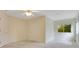 Bedroom featuring neutral paint, tile and carpet flooring, and natural light at 529 Quail Down Dr, Debary, FL 32713