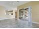 Living room showcases tile flooring and sliding glass doors leading to a patio at 529 Quail Down Dr, Debary, FL 32713