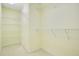 Spacious walk-in closet with multiple wire shelves for ample storage at 529 Quail Down Dr, Debary, FL 32713