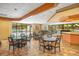 Spacious dining area with large windows, tiled floors and community pool views at 530 E Central Blvd # 406, Orlando, FL 32801