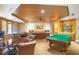 Inviting game room includes a pool table, card tables, and a relaxing lounge area at 530 E Central Blvd # 406, Orlando, FL 32801