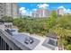 A beautiful outdoor lounge area offers comfortable seating and well manicured grounds at 530 E Central Blvd # 406, Orlando, FL 32801