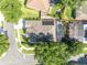 Charming home featuring a screened-in pool, solar panels, and lush landscaping in a desirable neighborhood at 533 Pickfair Ter, Lake Mary, FL 32746
