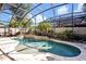 Sparkling pool surrounded by lush landscaping, creating a private backyard retreat at 533 Pickfair Ter, Lake Mary, FL 32746