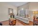 Cozy sitting area with hardwood flooring, natural light, and comfortable seating at 533 Pickfair Ter, Lake Mary, FL 32746