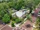 Stunning aerial view of the property showcasing the building's architecture and lush landscaping at 548 S Hyer Ave # 1, Orlando, FL 32801