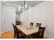 Elegant dining room with modern lighting fixture, barrel ceiling and room for six guests at 548 S Hyer Ave # 1, Orlando, FL 32801