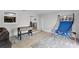Spacious game room featuring a foosball table and basketball game for indoor fun at 558 Tyler Ave, Deltona, FL 32725