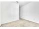 Spacious bedroom with neutral carpet and baseboards providing an open space at 8518 Nemours Pkwy, Orlando, FL 32827
