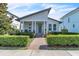 Charming single-story home featuring a modern design and well-manicured landscaping at 8518 Nemours Pkwy, Orlando, FL 32827