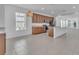 Spacious kitchen featuring stainless steel appliances, granite counters, and ample space at 8518 Nemours Pkwy, Orlando, FL 32827