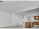 Open concept living space includes a modern kitchen with an island for casual dining at 8518 Nemours Pkwy, Orlando, FL 32827