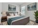 Beautiful main bedroom featuring tasteful decorations, window, and rug enhancing the style at 8518 Nemours Pkwy, Orlando, FL 32827