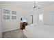 Comfortable bedroom with soft carpet, ensuite bath, and a TV for relaxing evenings at 8822 Interlocking Ct, Davenport, FL 33896