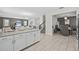 Spacious living space combines the kitchen, dining, and living room in an open-concept design at 8822 Interlocking Ct, Davenport, FL 33896