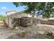 This house has a screened in patio and a spacious backyard at 9145 Fort Jefferson Blvd, Orlando, FL 32822